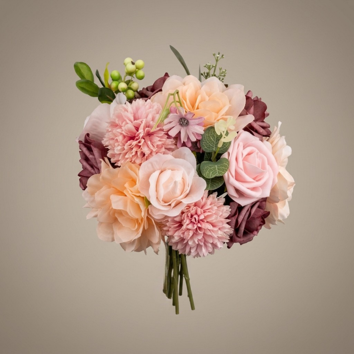 Blush, peach and mauve silk bridal bouquet with roses, dahlias, and eucalyptus greenery, close-up front view